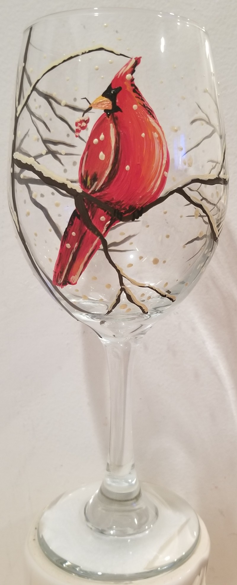 Adult Play. Cardinal on wine glass. One ticket covers two glasses